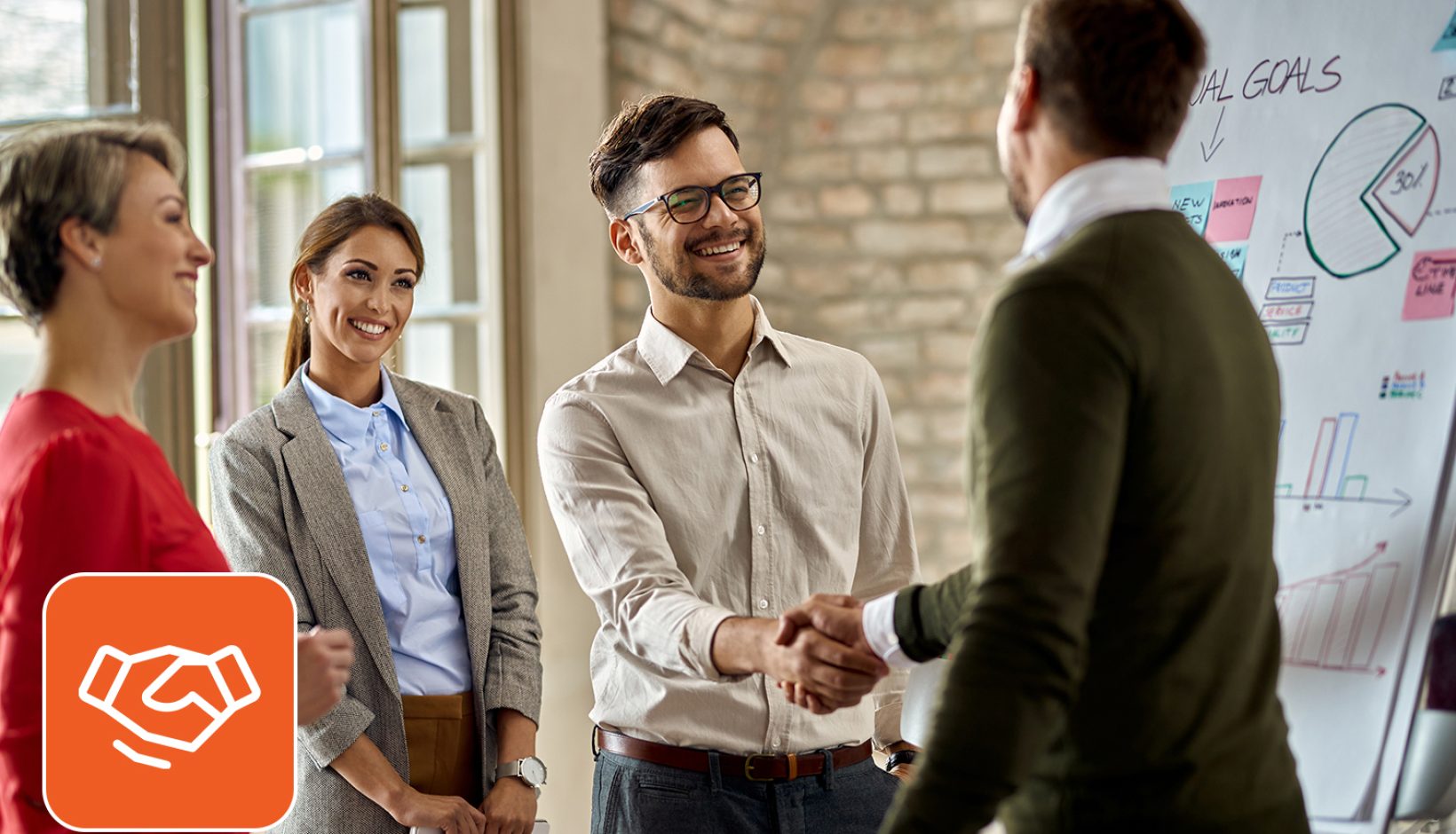 Managers happily shaking hands with the newly hired teammate